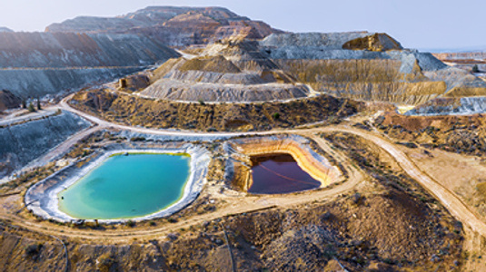 Skouriotissa copper mine in Cyprus with ore piles