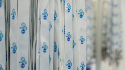 SETAC lanyards hanging on a display