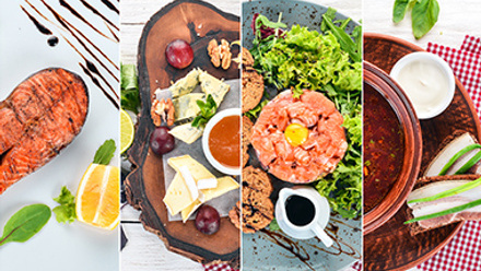 Collage of dishes. Salads, snacks, and meat dishes and fish. On a wooden background. Top view.