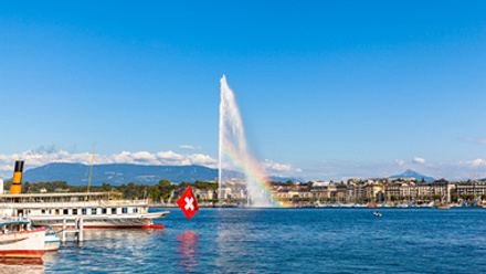 Jet D'eau Lake Geneva with city in back