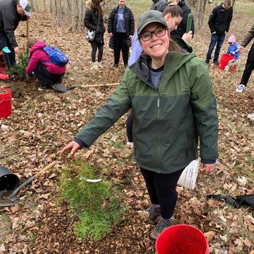 LSETAC Earth Day participant planting tree