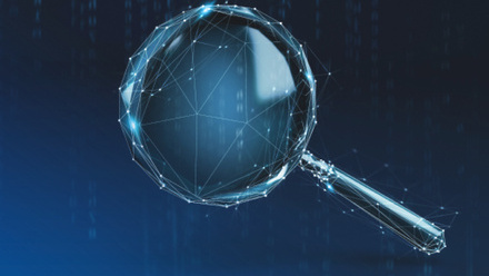 Magnifying glass on blue background