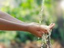 clean water running through hands